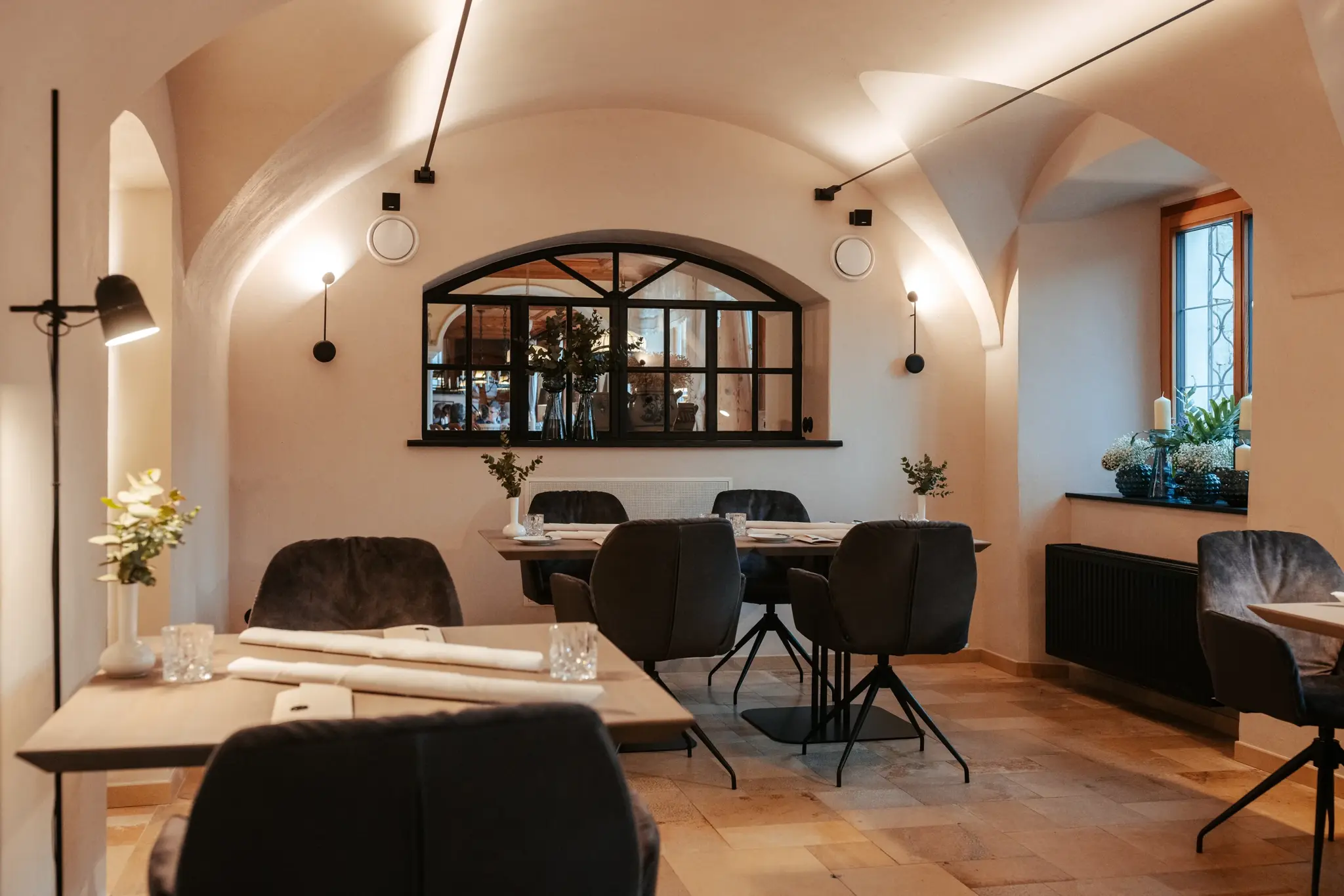 Modern interior of Restaurant 141 with set tables